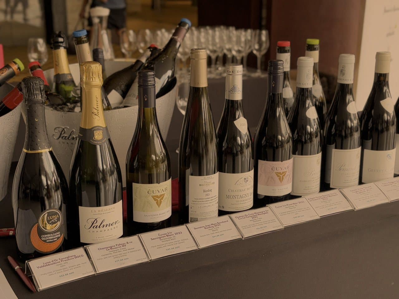 Wine and champagne bottles at a tasting