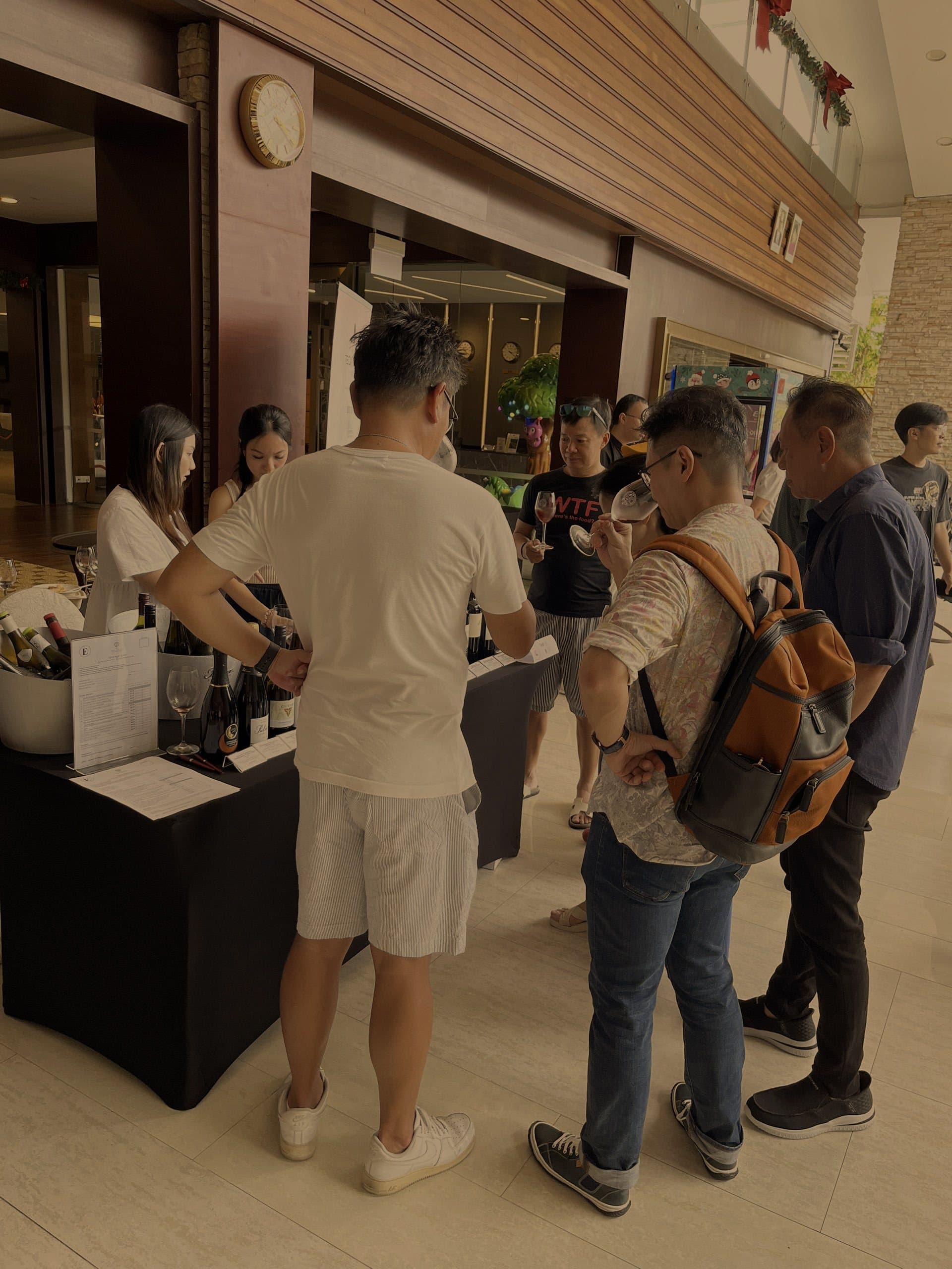 Guests at a wine tasting event